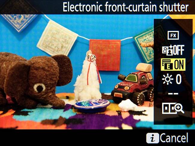 Press the i Button during Live View shooting to access various features, such as the Electronic Front-Curtain Shutter.