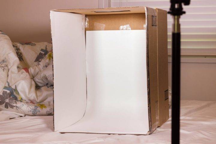 Use of White Cardboard paper inside the lightbox